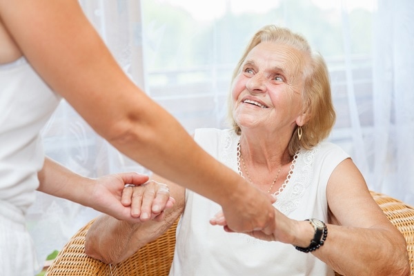 Elderly woman receiving non-medical in-home care service