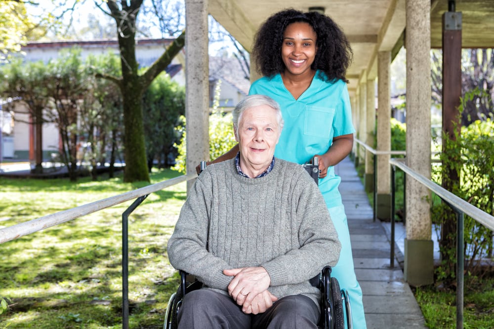 Home Caregiver providing care and support to elder adult